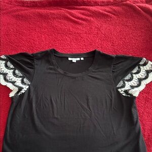 Elegant Black Top with Lace Sleeves